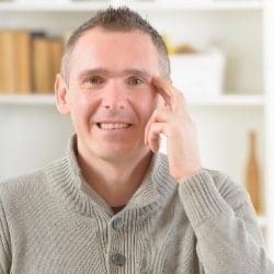 man-using-eft-tapping-for-pain-7304825